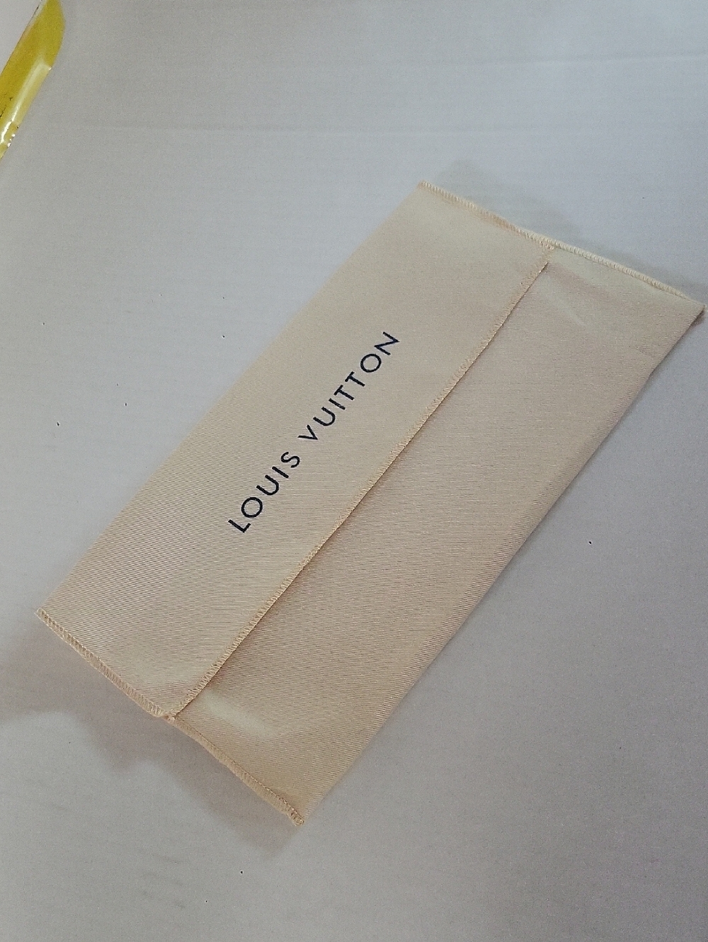 Louis Vuitton Beige Logo Pouch